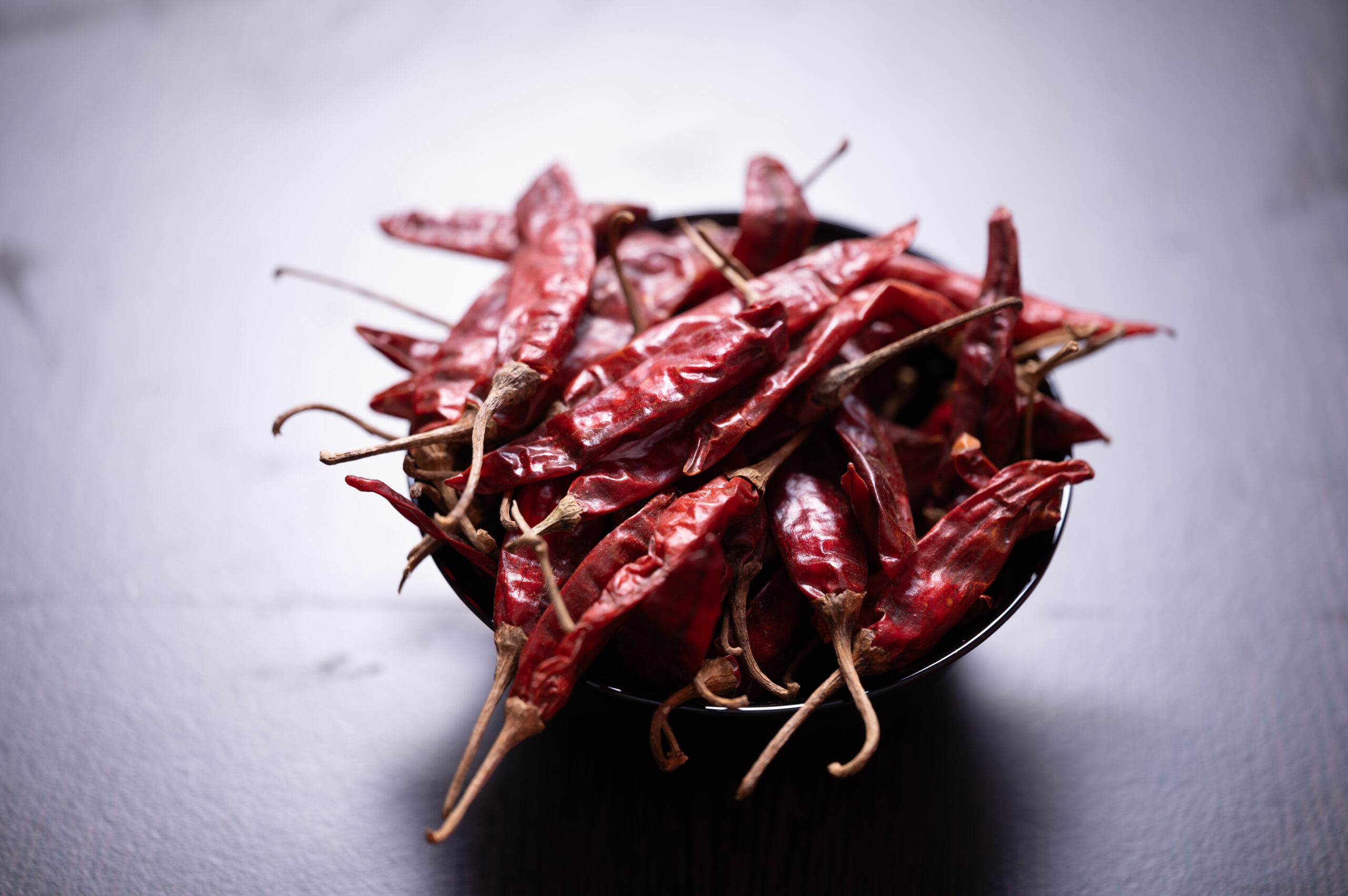 Dry red chilli — Byadgi variety, deep red and wrinkled, prized for colour extraction